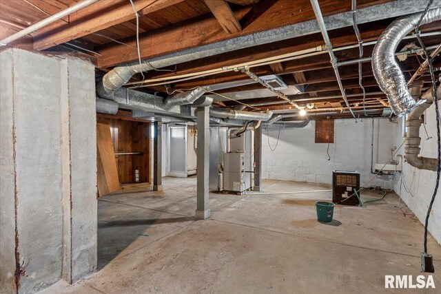 708 E 5th St, Pana, IL 62557 - unfinished basement with heating unit