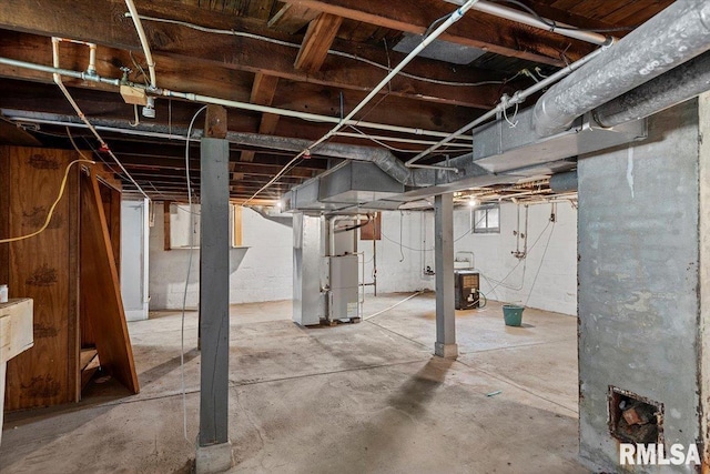 708 E 5th St, Pana, IL 62557 - below grade area featuring heating unit