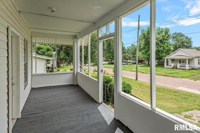 708 E 5th St, Pana, IL 62557 - unfurnished sunroom with healthy amount of natural light