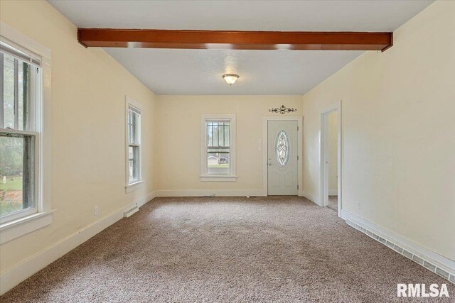 708 E 5th St, Pana, IL 62557 - unfurnished room featuring beamed ceiling and carpet flooring