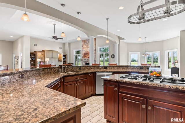 4901 Wildcat Run, Springfield, IL 62711 - kitchen featuring appliances with stainless steel finishes, a sink, ornate columns, ceiling fan, and recessed lighting