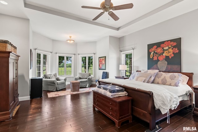 4901 Wildcat Run, Springfield, IL 62711 - bedroom featuring dark wood-style floors, baseboards, a ceiling fan, and a raised ceiling