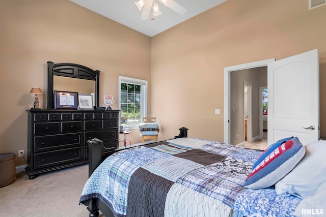 4901 Wildcat Run, Springfield, IL 62711 - bedroom featuring a towering ceiling, light carpet, baseboards, and ceiling fan