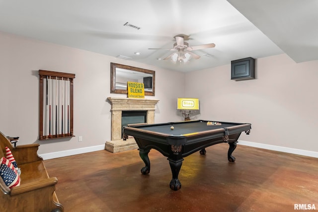 4901 Wildcat Run, Springfield, IL 62711 - game room with baseboards, concrete flooring, ceiling fan, pool table, and a fireplace with raised hearth