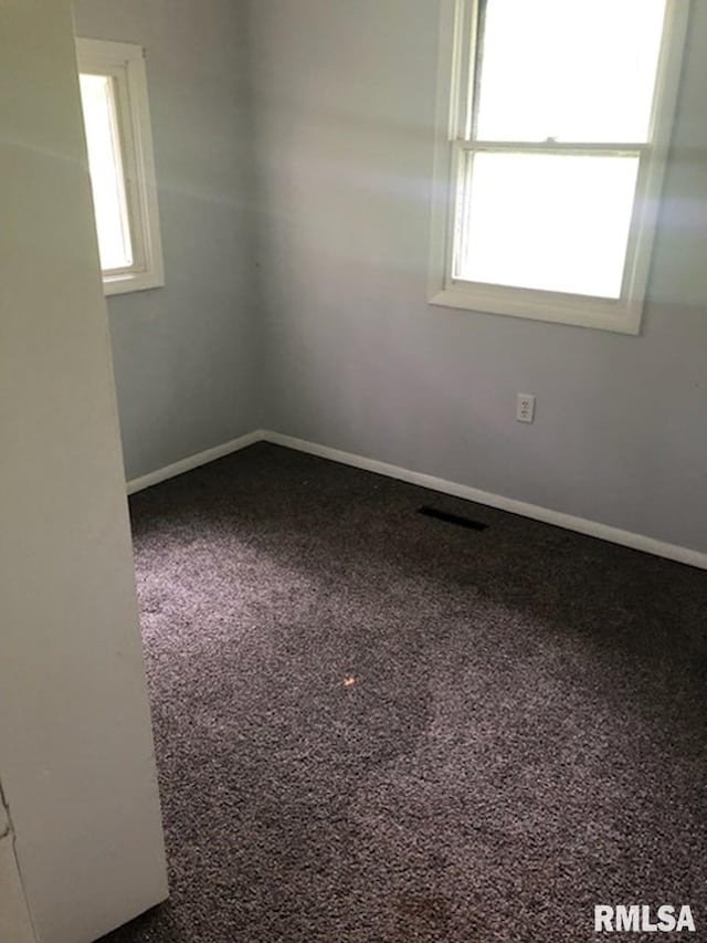 1522 Rim Rd, Quincy, IL 62305 - carpeted spare room with baseboards