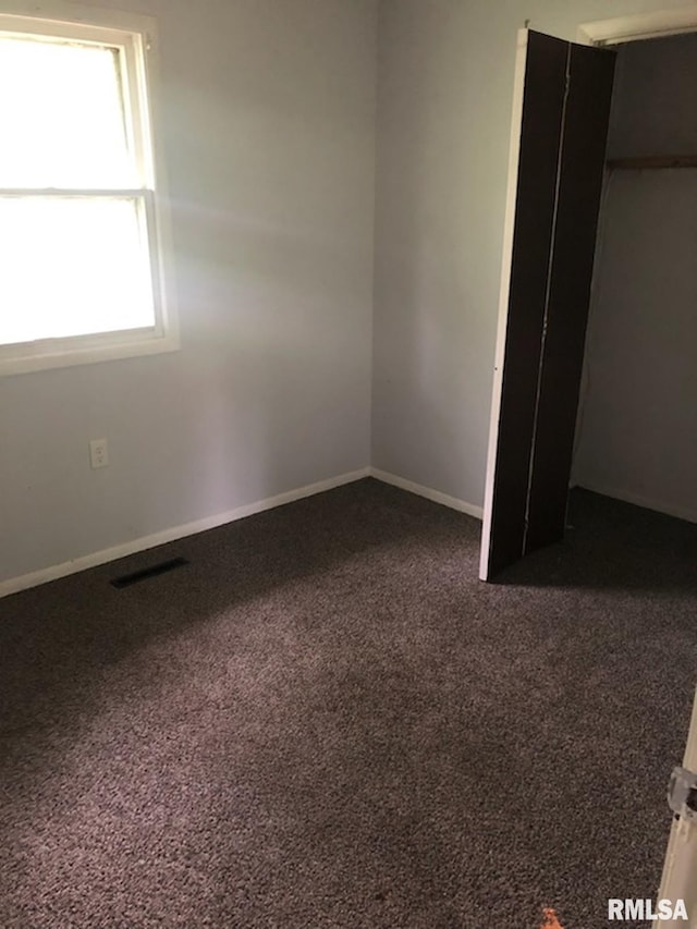 1522 Rim Rd, Quincy, IL 62305 - unfurnished bedroom featuring carpet floors and baseboards