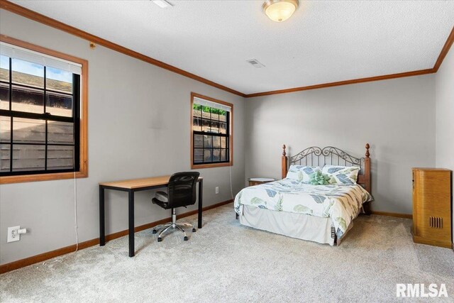 160 S Durkin Dr Unit 11, Springfield, IL 62704 - carpeted bedroom with baseboards, ornamental molding, a desk, and a textured ceiling