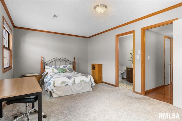160 S Durkin Dr Unit 11, Springfield, IL 62704 - carpeted bedroom with ornamental molding, baseboards, and a textured ceiling