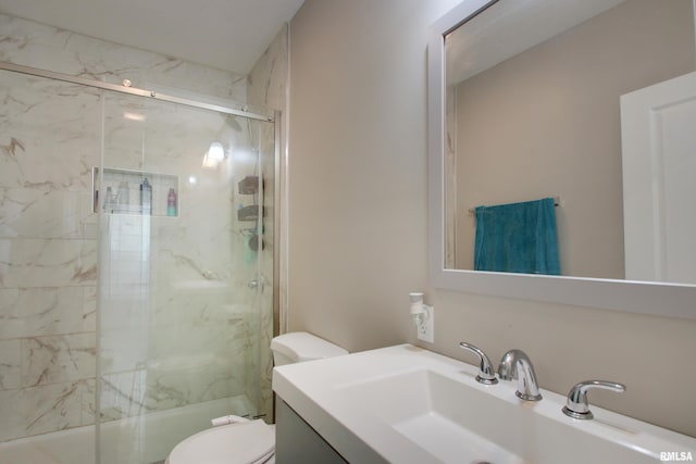 801 S 22nd St, Quincy, IL 62301 - bathroom featuring a marble finish shower, toilet, and vanity