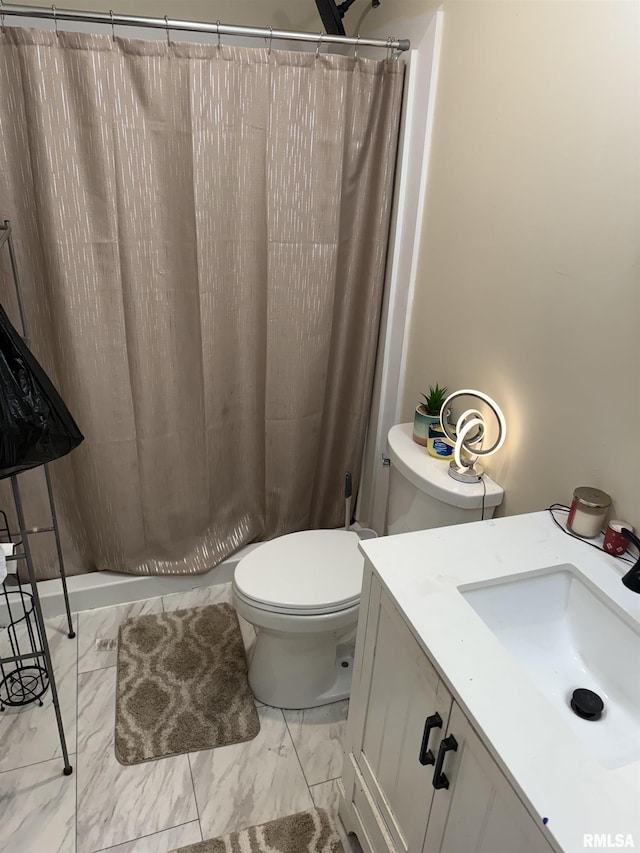 2853 Hoover Ave, Springfield, IL 62703 - full bath with marble finish flooring, toilet, vanity, and a shower with curtain