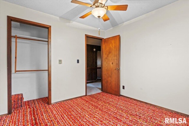 34831 Greenland Rd, Virden, IL 62690 - unfurnished bedroom featuring carpet, a closet, and ceiling fan