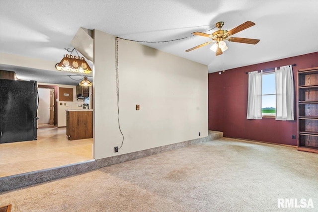 34831 Greenland Rd, Virden, IL 62690 - spare room with carpet flooring and ceiling fan