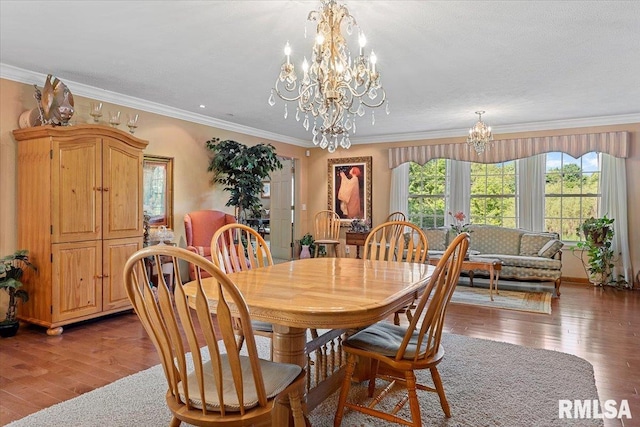 4 Nightingale Dr, Springfield, IL 62711 - dining space with a chandelier, wood-type flooring, and crown molding