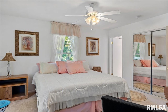 4 Nightingale Dr, Springfield, IL 62711 - carpeted bedroom with a closet, ceiling fan, and baseboards