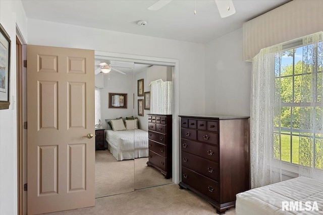 4 Nightingale Dr, Springfield, IL 62711 - bedroom with light carpet, multiple windows, a closet, and a ceiling fan
