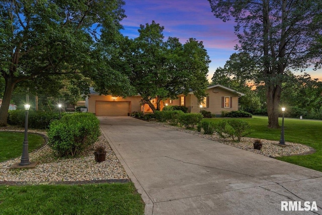 4 Nightingale Dr, Springfield, IL 62711 - view of front of home with driveway, a front yard, and a garage