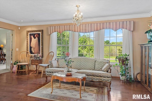 4 Nightingale Dr, Springfield, IL 62711 - living area with crown molding, a chandelier, plenty of natural light, wood finished floors, and baseboards