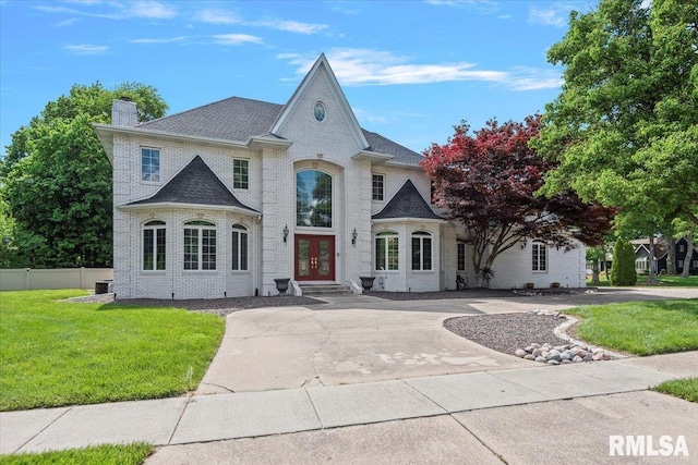505 Clipper Rd, Springfield, IL 62704 - french country home featuring french doors, a chimney, brick siding, cooling unit, and a shingled roof