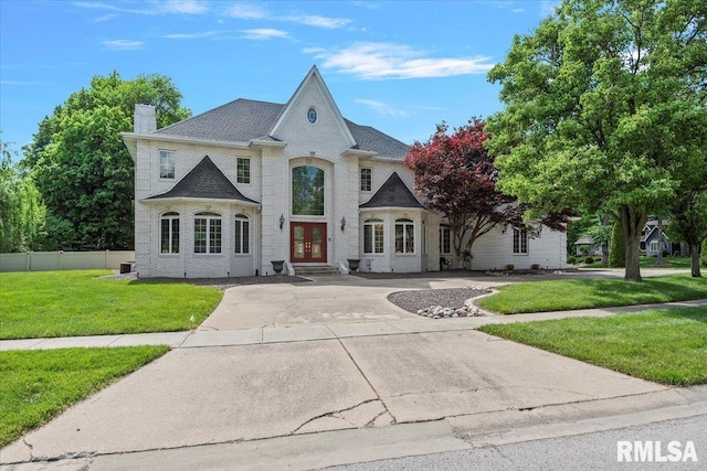 505 Clipper Rd, Springfield, IL 62704 - french country home with a chimney, french doors, and driveway