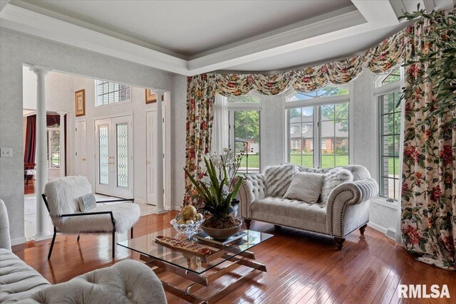 505 Clipper Rd, Springfield, IL 62704 - living room featuring plenty of natural light, wood-type flooring, baseboards, ornamental molding, and decorative columns