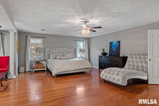505 Clipper Rd, Springfield, IL 62704 - bedroom featuring wood finished floors, a textured ceiling, baseboards, and ceiling fan