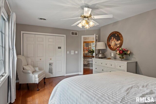 505 Clipper Rd, Springfield, IL 62704 - bedroom featuring wood finished floors, a closet, a ceiling fan, and baseboards