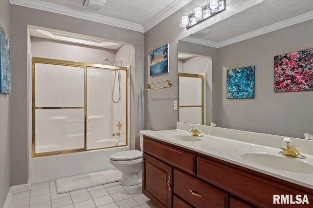 505 Clipper Rd, Springfield, IL 62704 - full bath featuring toilet, double vanity, tile patterned floors, shower / bath combination with glass door, and ornamental molding