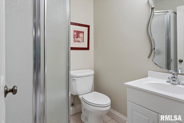 505 Clipper Rd, Springfield, IL 62704 - bathroom featuring toilet, vanity, tile patterned floors, a shower with door, and baseboards