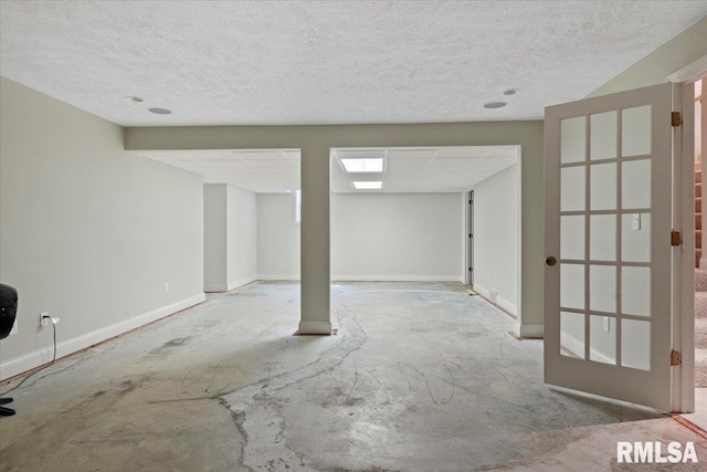 505 Clipper Rd, Springfield, IL 62704 - basement with a textured ceiling and baseboards