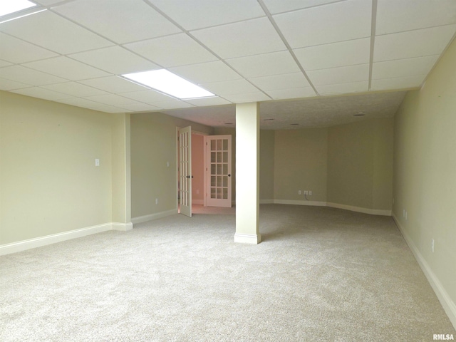 505 Clipper Rd, Springfield, IL 62704 - below grade area with light carpet, a drop ceiling, and baseboards