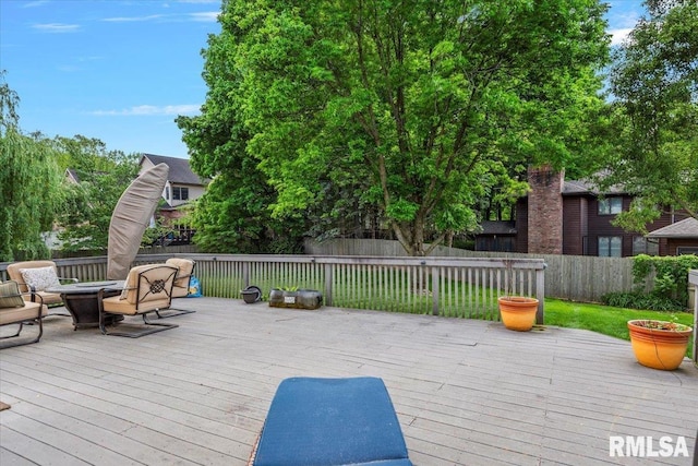 505 Clipper Rd, Springfield, IL 62704 - wooden deck featuring a fenced backyard and a fire pit