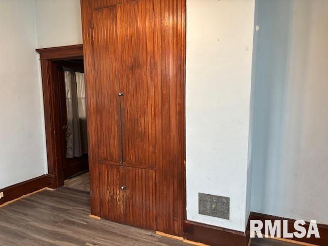 412 Pine St, Greenfield, IL 62044 - detailed view of wood finished floors and baseboards