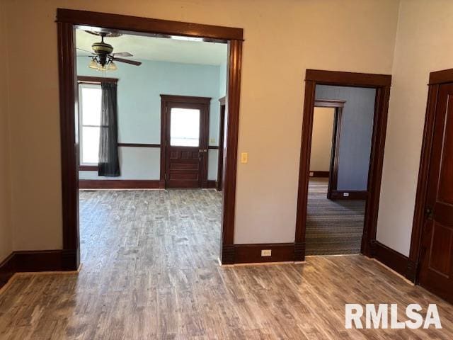 412 Pine St, Greenfield, IL 62044 - hallway with baseboards and wood finished floors