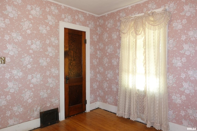 345 Division St, Galesburg, IL 61401 - unfurnished room featuring wood finished floors and ornamental molding