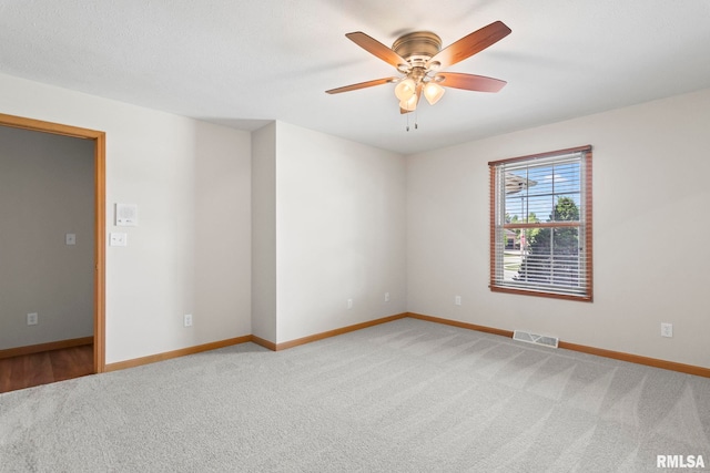 5021 Wildcat Run, Springfield, IL 62711 - empty room with light colored carpet, ceiling fan, and baseboards