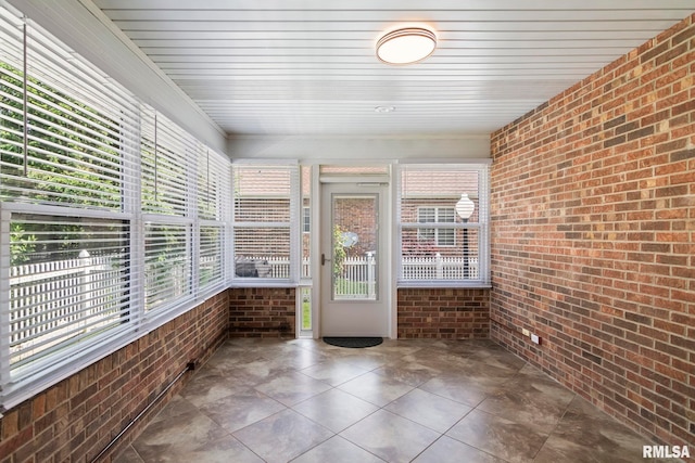 5021 Wildcat Run, Springfield, IL 62711 - unfurnished sunroom featuring brick wall and plenty of natural light