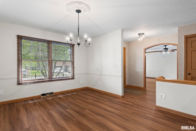 5021 Wildcat Run, Springfield, IL 62711 - empty room with wood finished floors, a chandelier, and baseboards