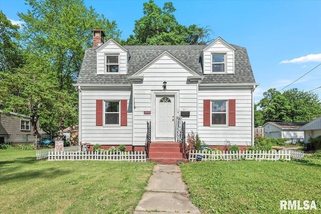 view of front of house featuring roof with shingles and a chimney