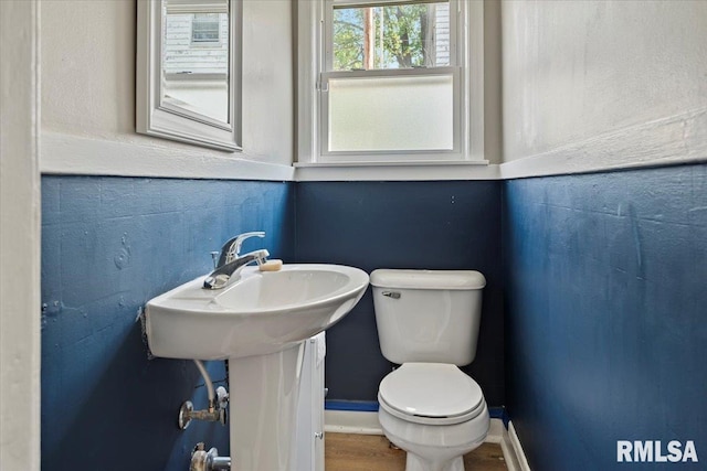 half bathroom with toilet