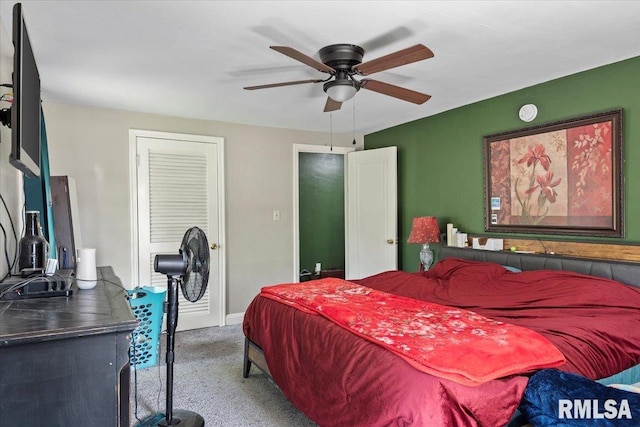 bedroom featuring carpet flooring, a ceiling fan, and baseboards