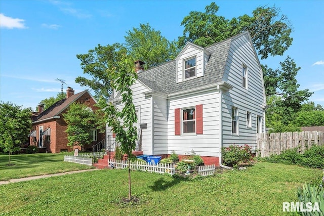 view of front of property featuring roof with shingles