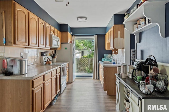 kitchen with white appliances, tasteful backsplash, wood finished floors, open shelves, and brown cabinets