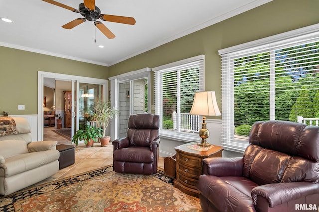 1625 Grace Ridge Rd, New Berlin, IL 62670 - living area featuring crown molding, a ceiling fan, tile patterned floors, recessed lighting, and a wainscoted wall