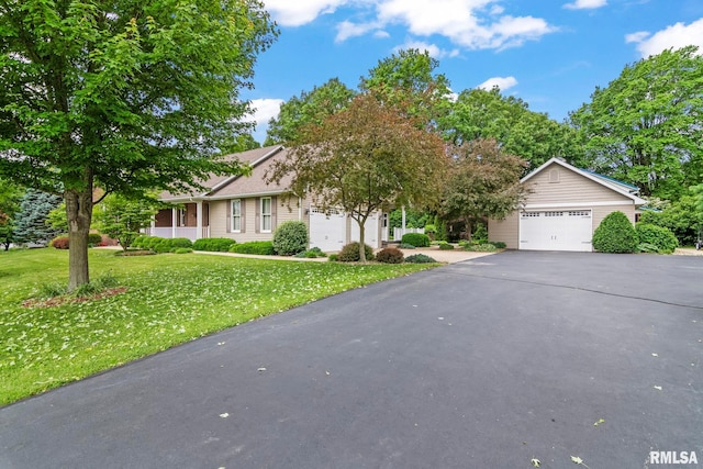 1625 Grace Ridge Rd, New Berlin, IL 62670 - view of front of property featuring a garage, a front lawn, and driveway