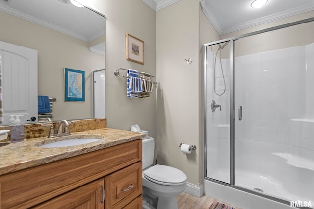 1625 Grace Ridge Rd, New Berlin, IL 62670 - full bath featuring ornamental molding, toilet, a stall shower, vanity, and wood finished floors