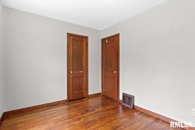 1816 S Street Ct, Springfield, IL 62703 - empty room with baseboards and wood finished floors