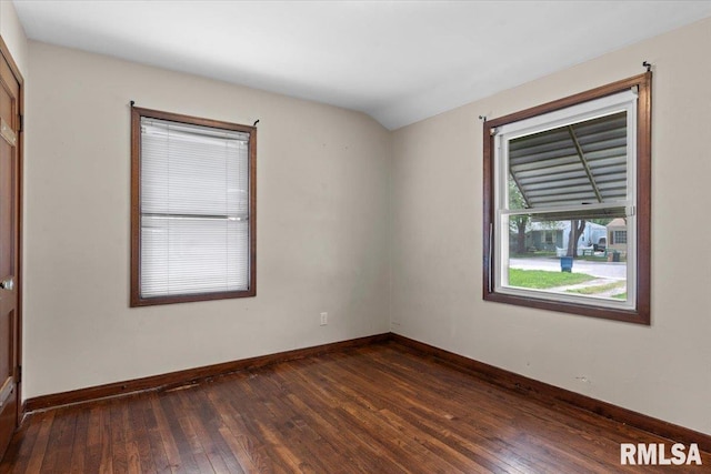 1816 S Street Ct, Springfield, IL 62703 - spare room featuring dark wood-style floors, baseboards, and vaulted ceiling