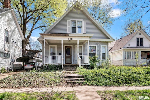 108 S Macarthur Blvd, Springfield, IL 62704 - bungalow with a detached carport and a porch