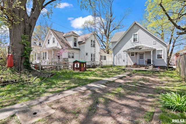 108 S Macarthur Blvd, Springfield, IL 62704 - rear view of property with a wooden deck and fence