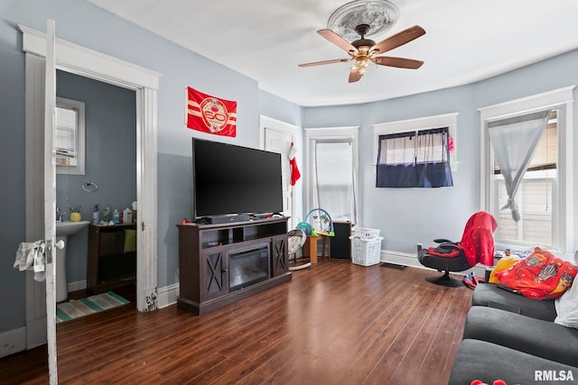 108 S Macarthur Blvd, Springfield, IL 62704 - living area featuring a ceiling fan, wood finished floors, and baseboards